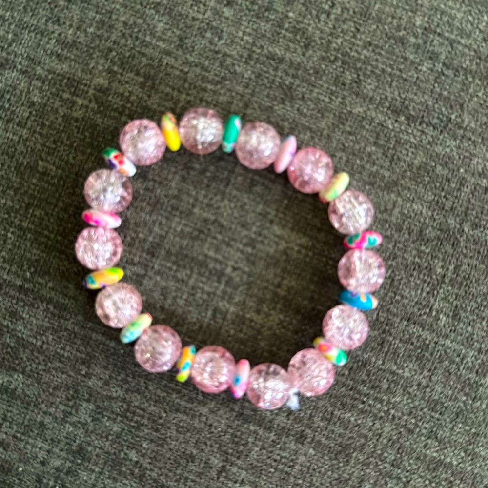 Handmade bracelet with pink glass and multi color clay beads
